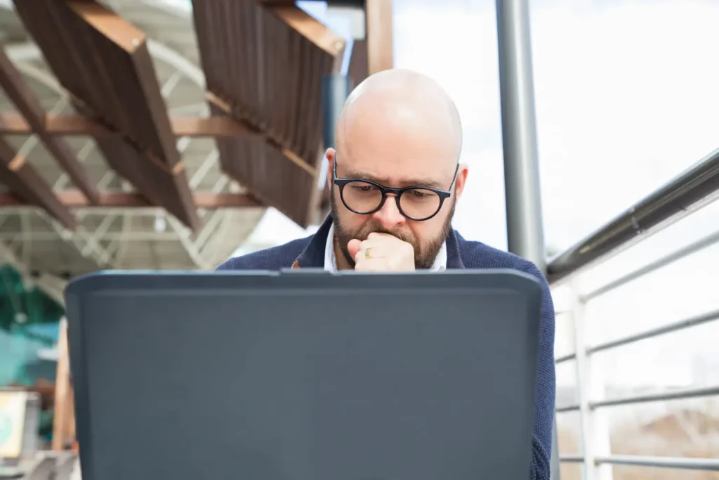 man pondering his certified business valuation