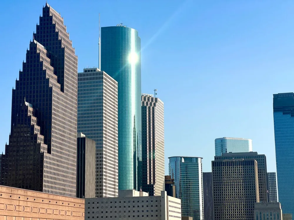 Houston skyscrapers under a clear blue sky
