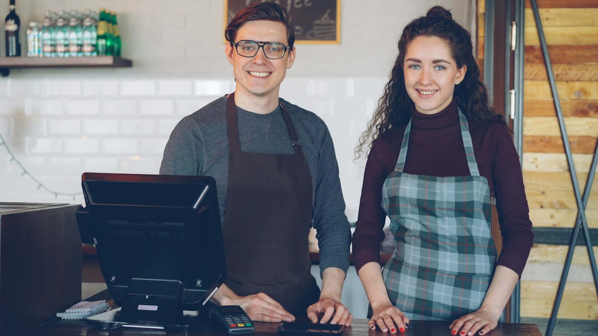 Valuing a small owner-operated business Two owners behind the counter of their small business