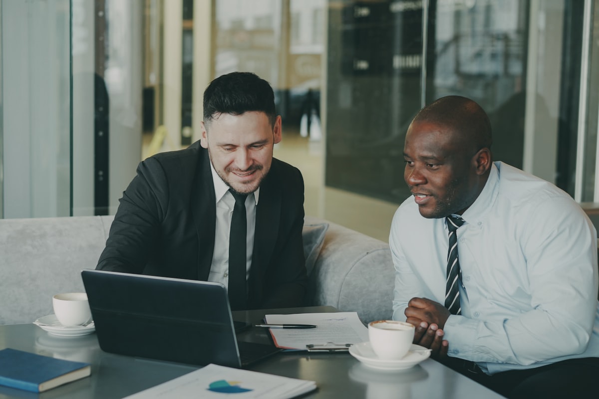 Advisory team reviewing comparable sale evidence for a business listing