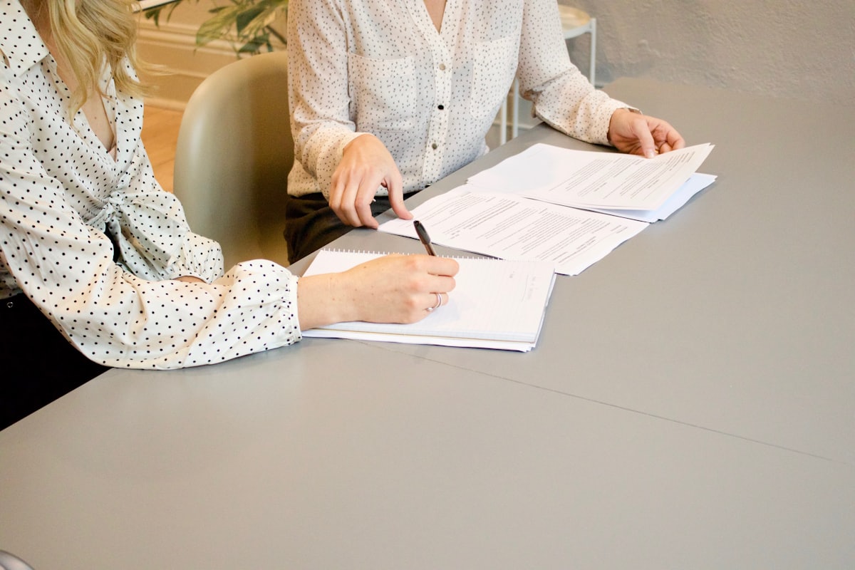 Business owner reviewing financial statements before going to market